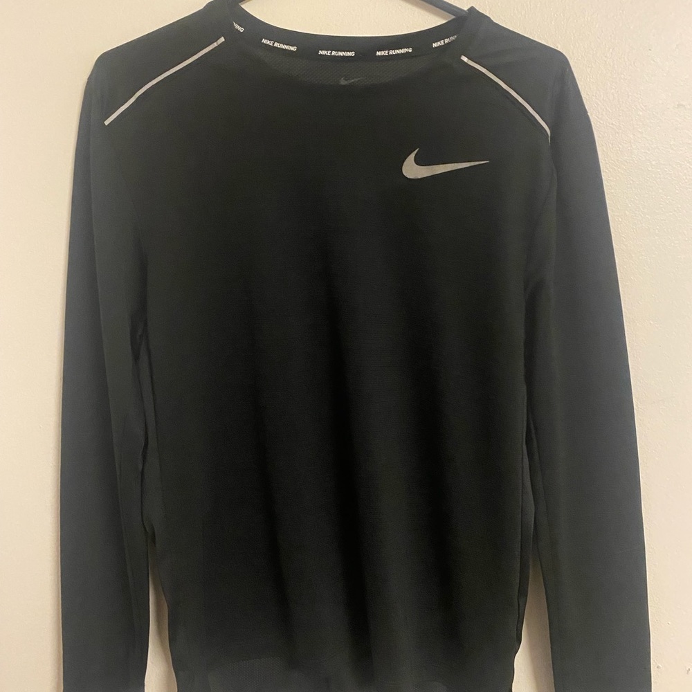 NIKE. Black long sleeve running shirt. Small